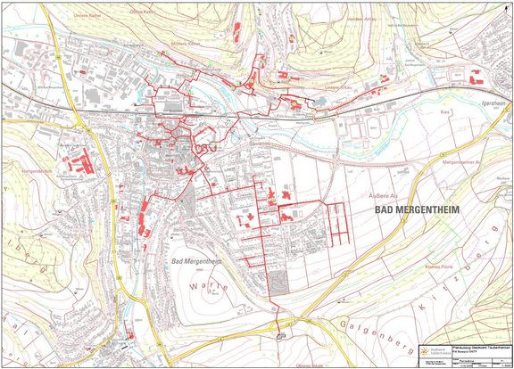 Kartenausschnitt von Bad Mergentheim: Stadtgebiet mit hervorgehobenen Gebäuden in rot. Die roten Gebäude zeigen, welche Bereiche in Bad Mergentheim bereits mit Wärme erschlossen sind.