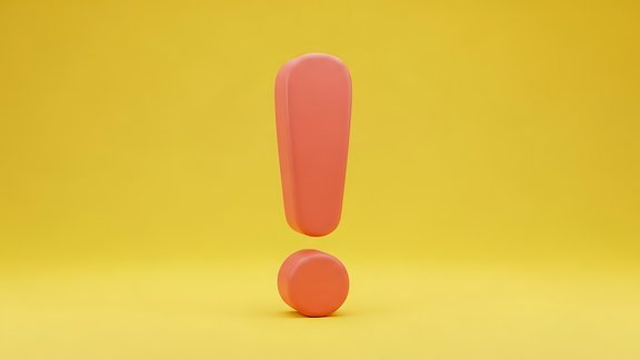 Orangefarbenes Ausrufezeichen auf gelbem Hintergrund